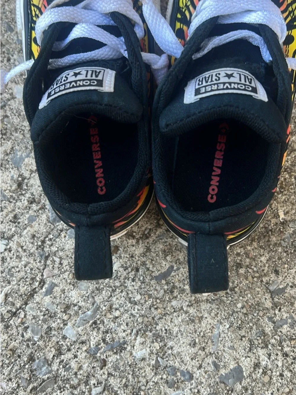 Converse Kids Low-Top Sneakers in Black with Red and Yellow Flame Print